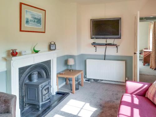 Et tv og/eller underholdning på Moorhouse Farm Cottage