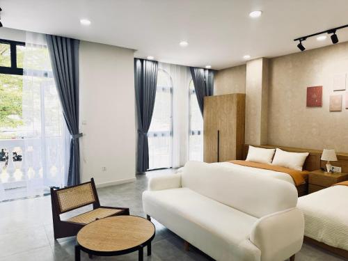 Cama o camas de una habitación en StayLa Homestay