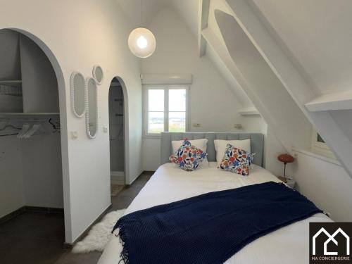 Ένα ή περισσότερα κρεβάτια σε δωμάτιο στο L'Echapée Belle du Mont Lambert