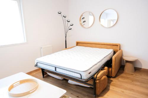 Ένα ή περισσότερα κρεβάτια σε δωμάτιο στο Rouen Gare centre Ménage et linge inclus