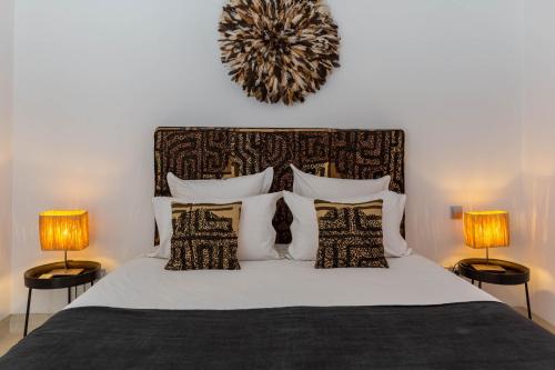 Postel nebo postele na pokoji v ubytování Douiria13