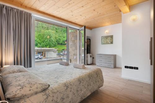 Postel nebo postele na pokoji v ubytování Appartamento Jubilant