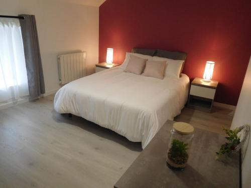 Postel nebo postele na pokoji v ubytování La maison de lave