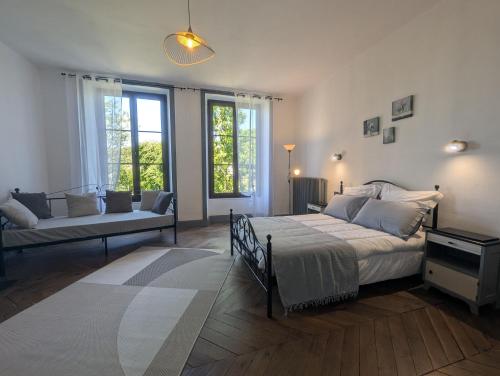 En eller flere senge i et værelse på La maison d'alice