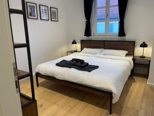 Postel nebo postele na pokoji v ubytování Juraperle - Historisch und modern - Wohnung 1