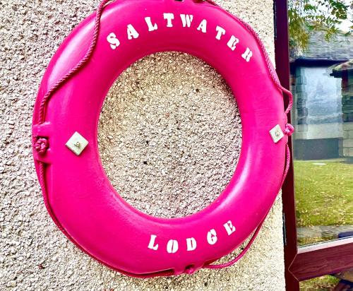 a pink horseshoe with the words auxiliary loadneau at 2 Bedroom Cornish Cottage For Penzance And St Ives in Penzance