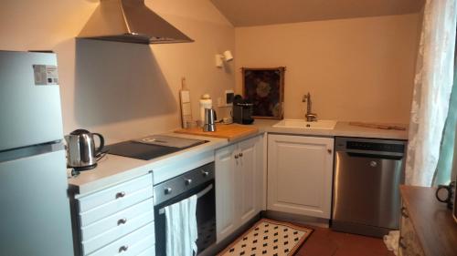 Een keuken of kitchenette bij Maison Jacquemin