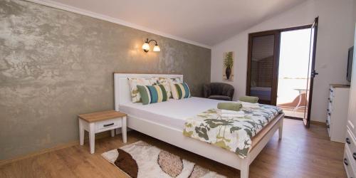 Llit o llits en una habitació de Nereo