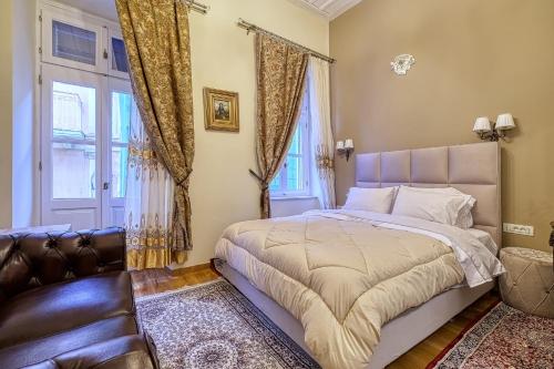 Ένα ή περισσότερα κρεβάτια σε δωμάτιο στο Theodoros Kolokotronis