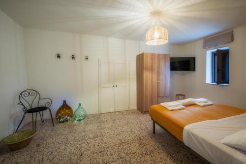 Ένα ή περισσότερα κρεβάτια σε δωμάτιο στο A Casicella Holiday Home