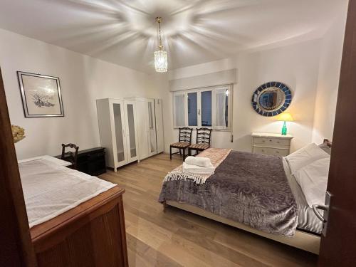 Postel nebo postele na pokoji v ubytování Number 3 APT, easy for Venice