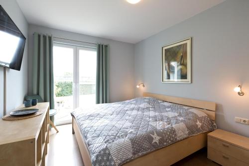 En eller flere senge i et værelse på Tap In