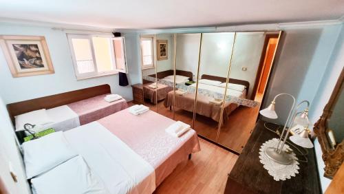 Ένα ή περισσότερα κρεβάτια σε δωμάτιο στο Bellavista-Spa Jacuzzi Sauna Pool