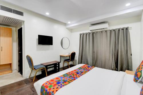 Μια τηλεόραση ή/και κέντρο ψυχαγωγίας στο FabHotel Veda Inn