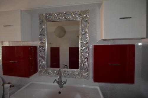 Ένα μπάνιο στο Villetta con giardino in contesto riservato non lontana dal mare BEL01