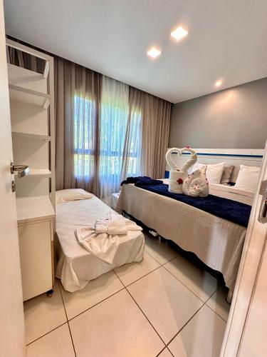 Postel nebo postele na pokoji v ubytování Vg sun Cumbuco