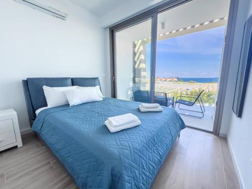 Ένα ή περισσότερα κρεβάτια σε δωμάτιο στο Azure Vista Collection