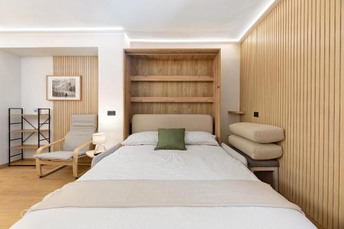 Ένα ή περισσότερα κρεβάτια σε δωμάτιο στο Madesimo Ski Suite