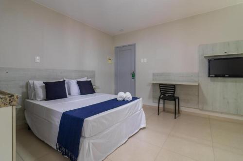 Postel nebo postele na pokoji v ubytování GoldMen Express Campos Goycatazes