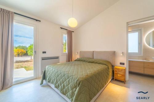 En eller flere senge i et værelse på Casa Luna - By Searly