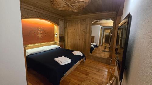 Ένα ή περισσότερα κρεβάτια σε δωμάτιο στο Excelsior