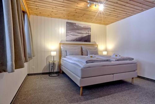 Postel nebo postele na pokoji v ubytování Apartment Babice 2.5 - GRIWA RENT AG