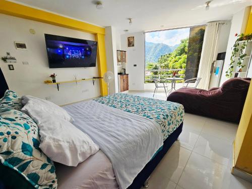 Postel nebo postele na pokoji v ubytování PIERO HOUSE - La Merced