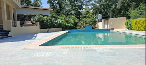 Πισίνα στο ή κοντά στο The Jungle Gate Villa