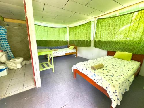 Postel nebo postele na pokoji v ubytování Aventour Expeditions Lodge