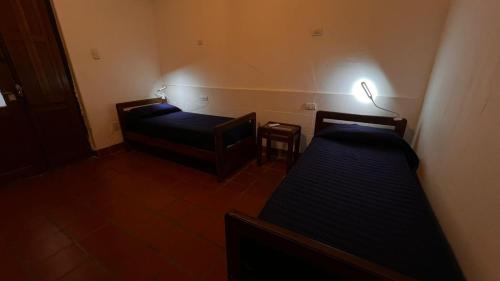 Cama o camas de una habitación en Total Hostel Salta