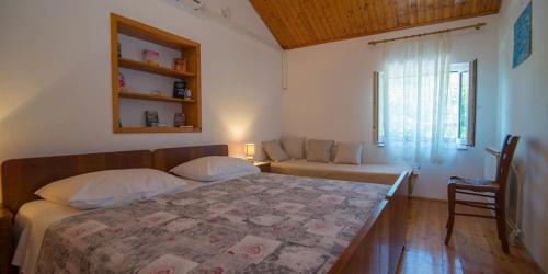 Ένα ή περισσότερα κρεβάτια σε δωμάτιο στο Teo