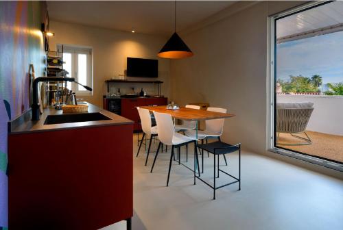 Η κουζίνα ή μικρή κουζίνα στο Nichis Apartment Relais