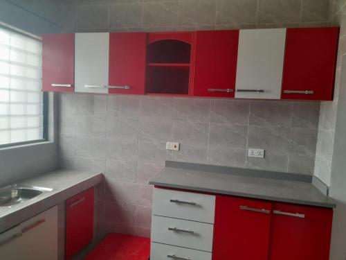 Η κουζίνα ή μικρή κουζίνα στο The Eli Villa