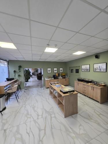 TV a/nebo společenská místnost v ubytování Hotel Delaf