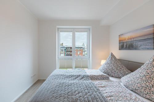 Кровать или кровати в номере Stadtlust 1