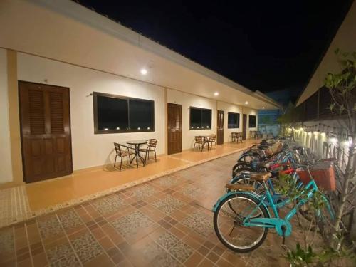 a row of bikes parked next to a building at Na Soi 5 Chiangkhan in Chiang Khan