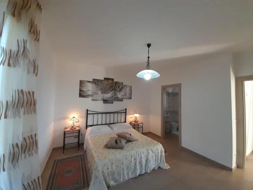 Ένα ή περισσότερα κρεβάτια σε δωμάτιο στο Agriturismo di lusso B&B Dileo Giovanni