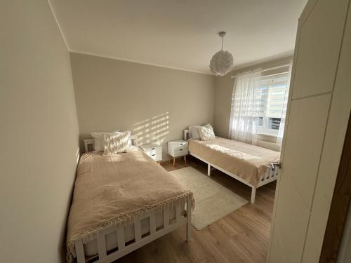 En eller flere senge i et værelse på Livs cozy corner