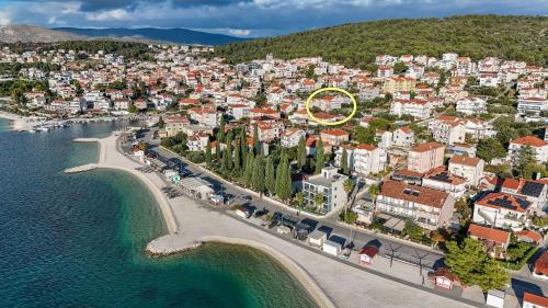 an aerial view of a town next to the water at Apartments Melita in Trogir