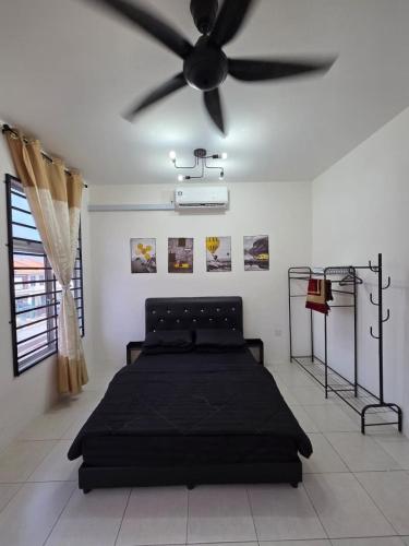 Postel nebo postele na pokoji v ubytování Home at Durian Tunggal