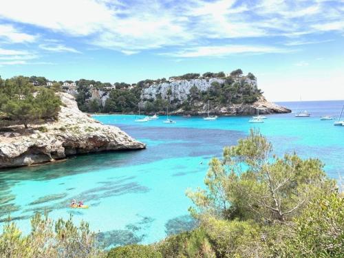 a view of a bay with boats in the water at La Corentine in Bandol