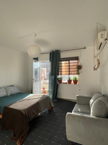 Ένα ή περισσότερα κρεβάτια σε δωμάτιο στο Central apartment with beautiful view