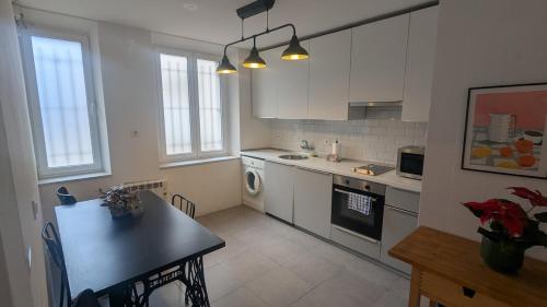 Η κουζίνα ή μικρή κουζίνα στο 659A by R2R Apartmento céntrico para 3 personas