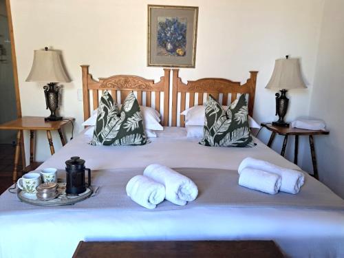 Кровать или кровати в номере Cypress Cottage No 80