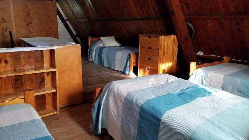 Ένα ή περισσότερα κρεβάτια σε δωμάτιο στο CASA CHOMULLCO, plena peatonal, entre 2da y 3ra bajada