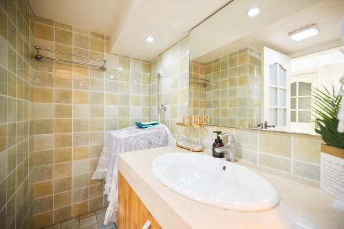 Koupelna v ubytování Ultimate Theme Apartment Universal Resort Store