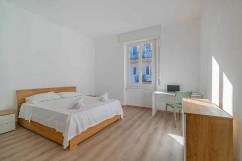 Ένα ή περισσότερα κρεβάτια σε δωμάτιο στο Bolzaneto Fresh & Brigh