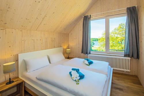 Postel nebo postele na pokoji v ubytování Seehaus Söt Mine mit Sauna