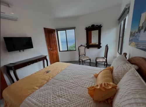 Postel nebo postele na pokoji v ubytování Hotel Vista Hermosa Suchitoto