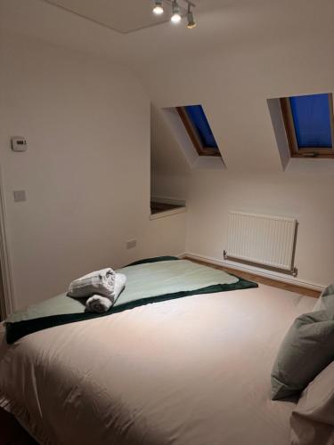 Giường trong phòng chung tại Chestnut Home